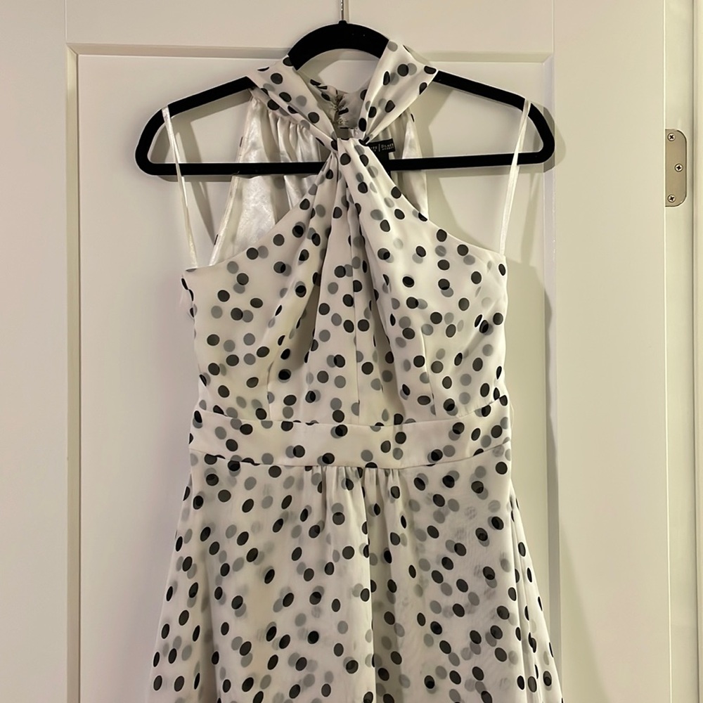 Adorable white polka dot knee length dress